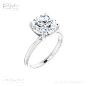 Image of a 3 carat round cut lab grown diamond engagement ring, a perfect symbol of love and commitment.